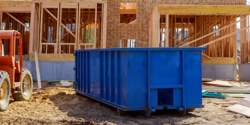 Blur,Dumpster,,Recycle,Waste,And,Garbage,Bins,Near,New,Construction