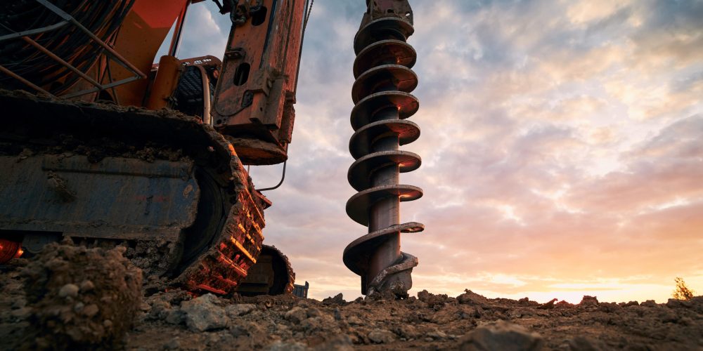 Building,Activity,On,Contruction,Site.,Close-up,View,Of,Drilling,Machine.